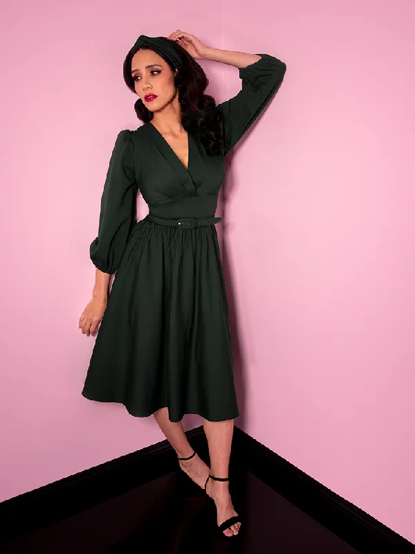 Bawdy Swing Dress in Hunter Green